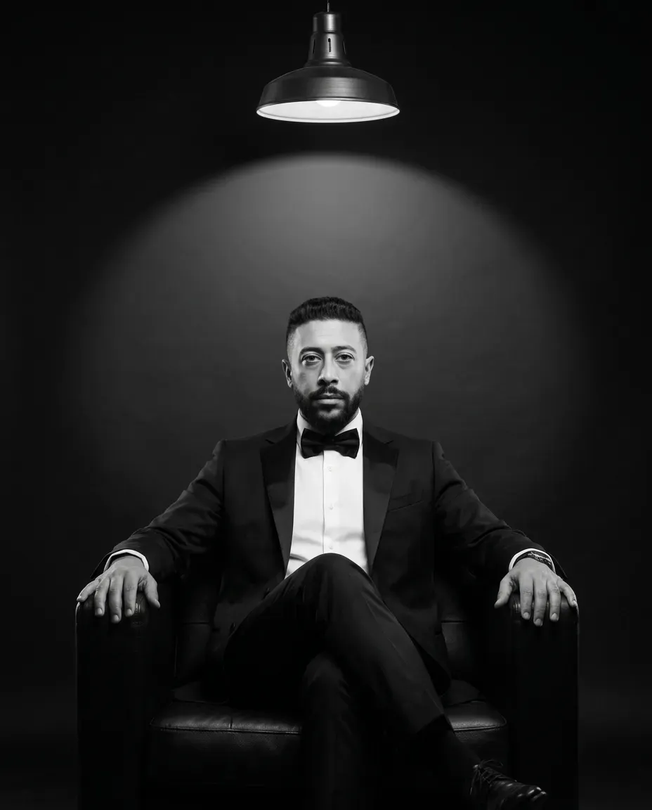 Cinematic Black-and-White Studio Portrait with Overhead Spotlight