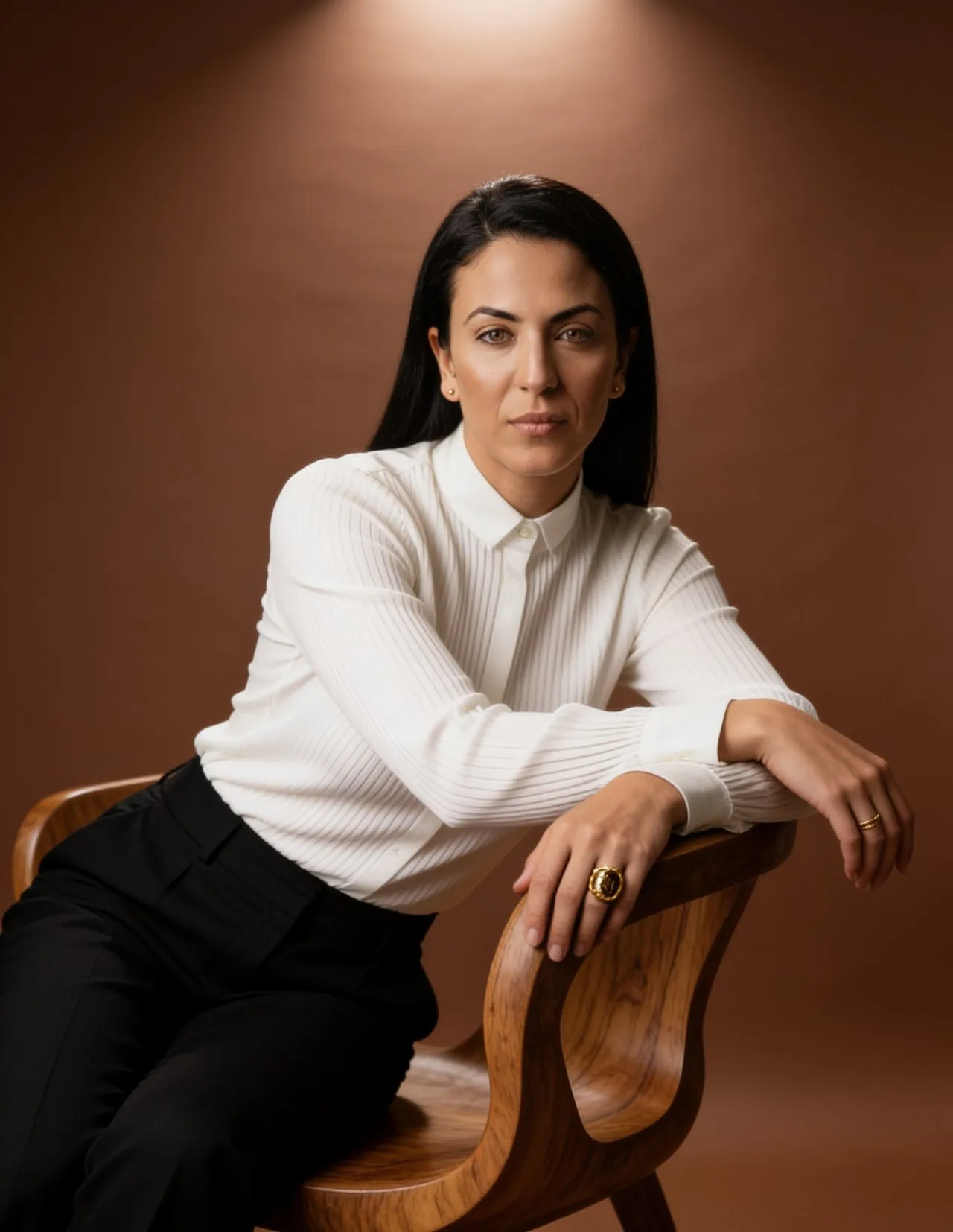 Refined Editorial Studio Portrait with Warm Brown Backdrop