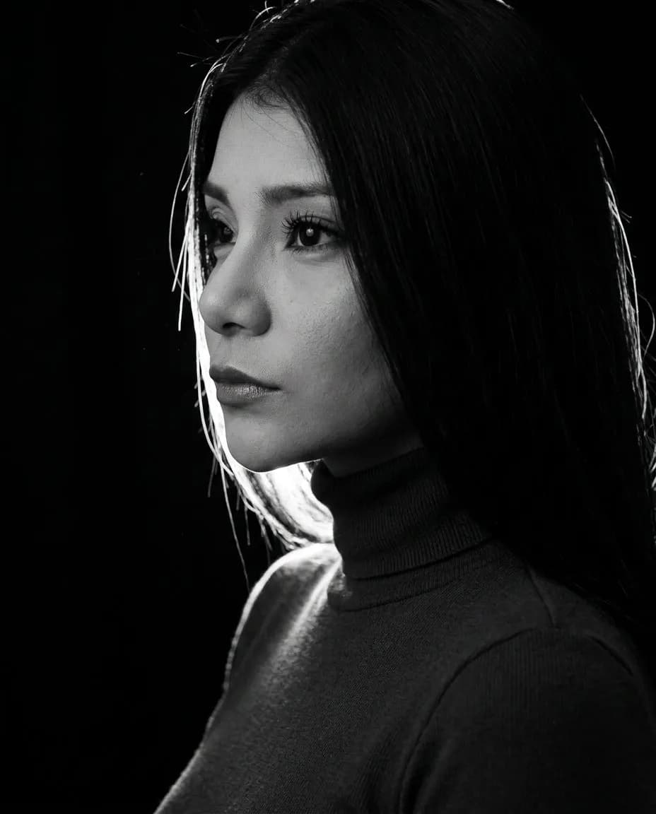 Minimalist High-Contrast Black-and-White Cinematic Side-Profile Portrait