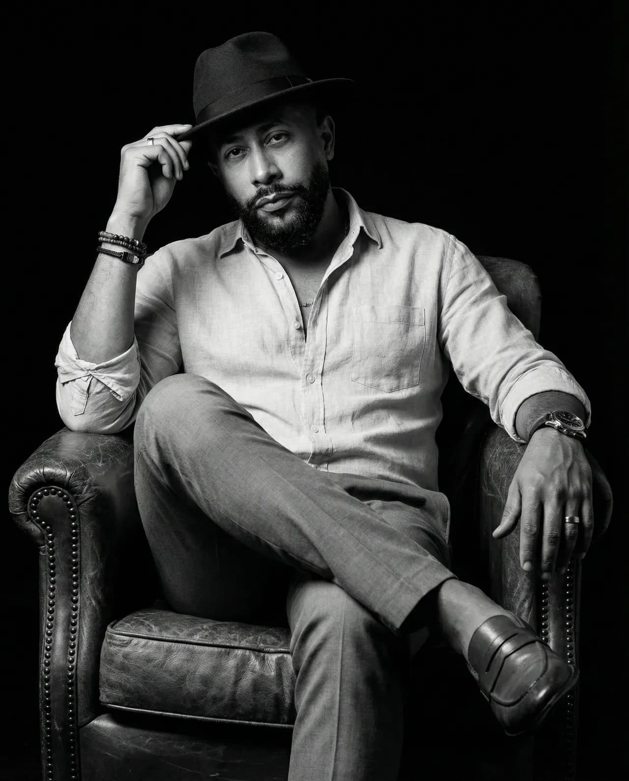 Black and White Cinematic Portrait of Timeless Masculine Elegance