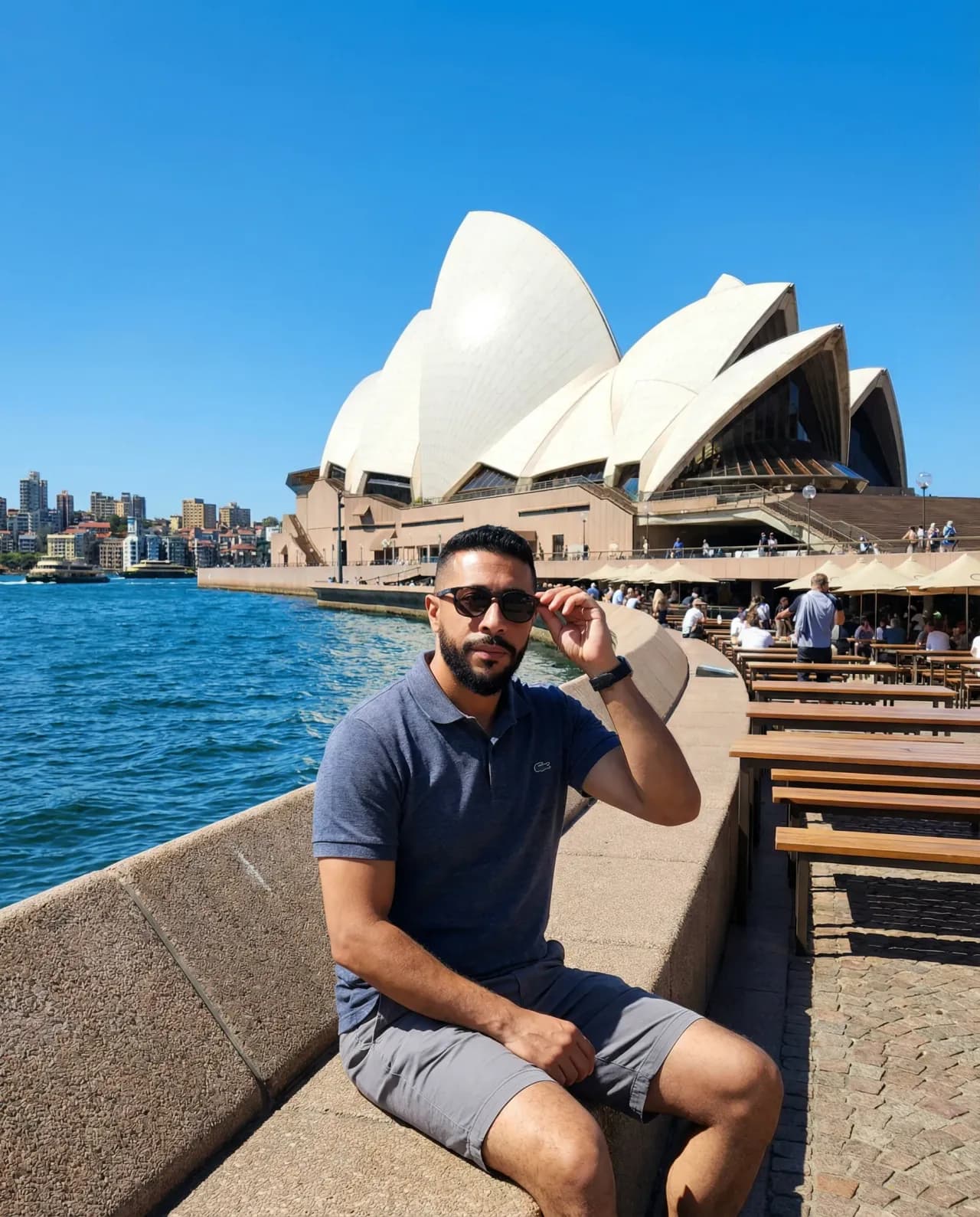 Cinematic Waterfront Portrait with Iconic Landmark Backdrop