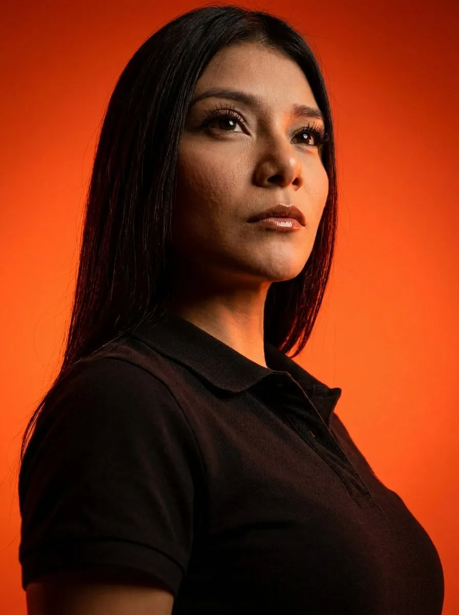 Cinematic Scarlet-Backed Editorial Studio Portrait (Low-Angle)