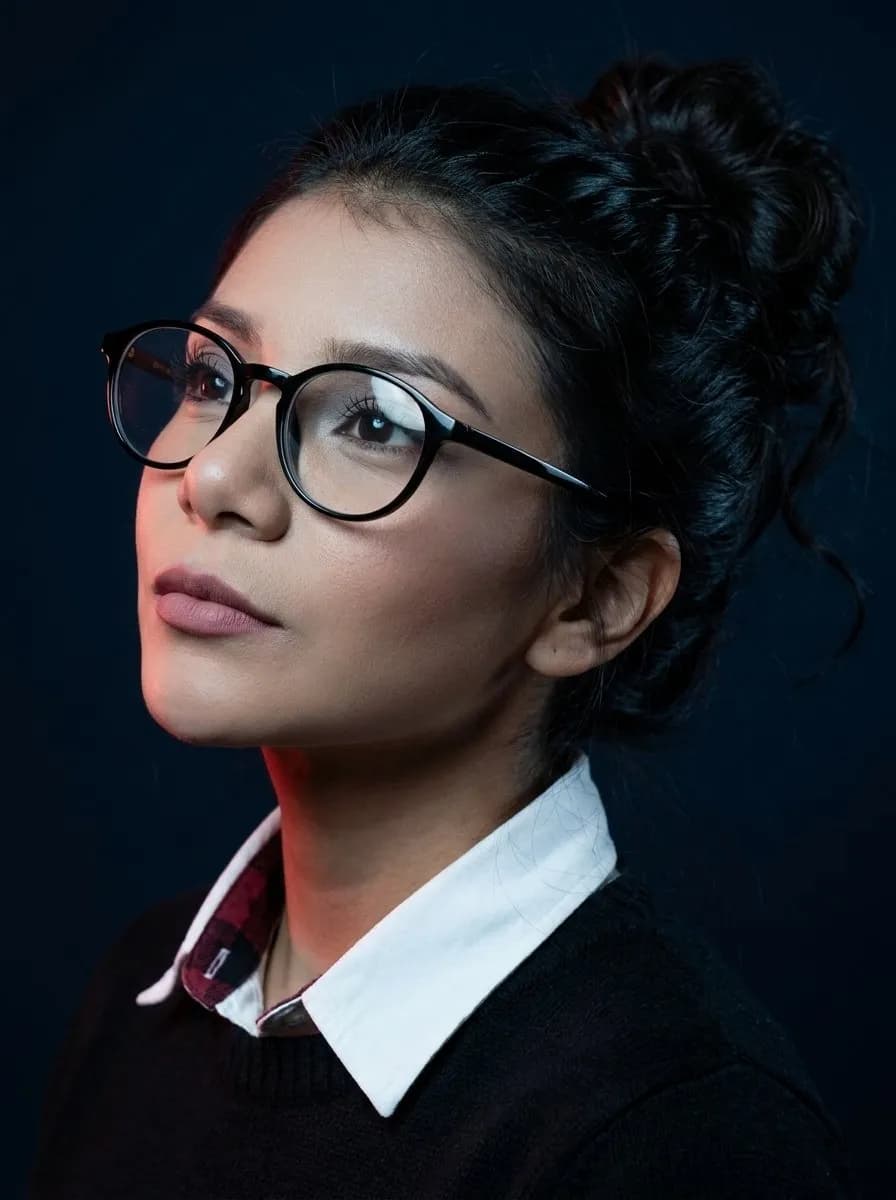 Cinematic Blue-Black Studio Portrait with Dual Tone Lighting
