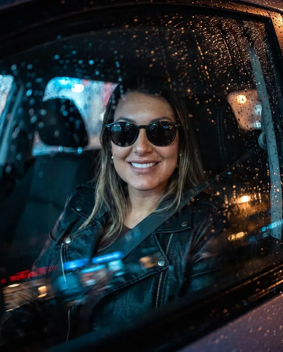 Neo-Noir Rain-Soaked Car Window Portrait with Moody Lighting
