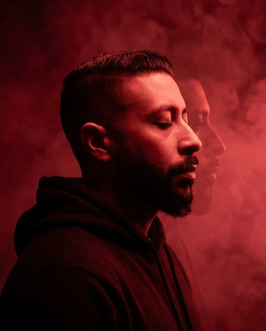 Cinematic Monochrome Red Side-Profile Portrait with Double Exposure