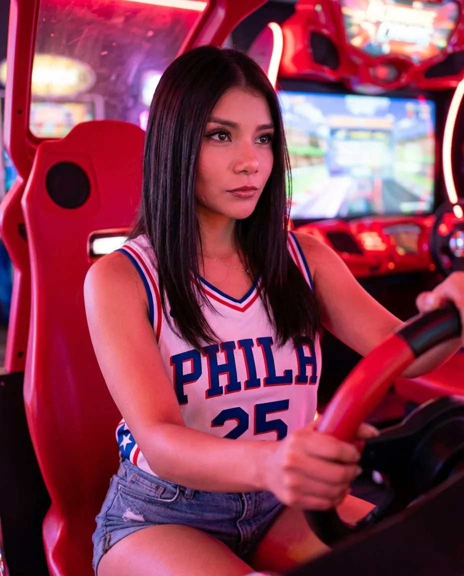 Arcade Racing Cockpit Portrait in Neon Red Cinematic Lighting