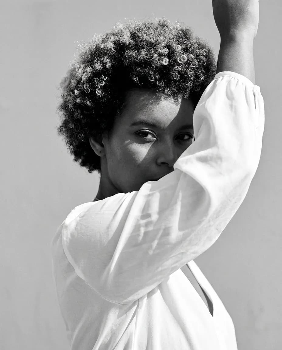 Monochrome High-Fashion Editorial Portrait with Harsh Sunlight