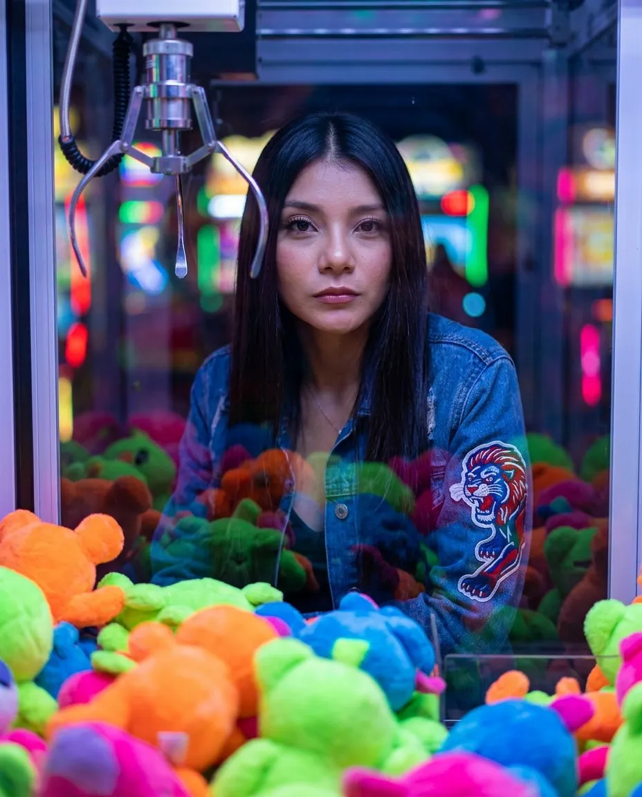 Vibrant Neon Claw Machine Portrait with Surreal Pop-Art Lighting