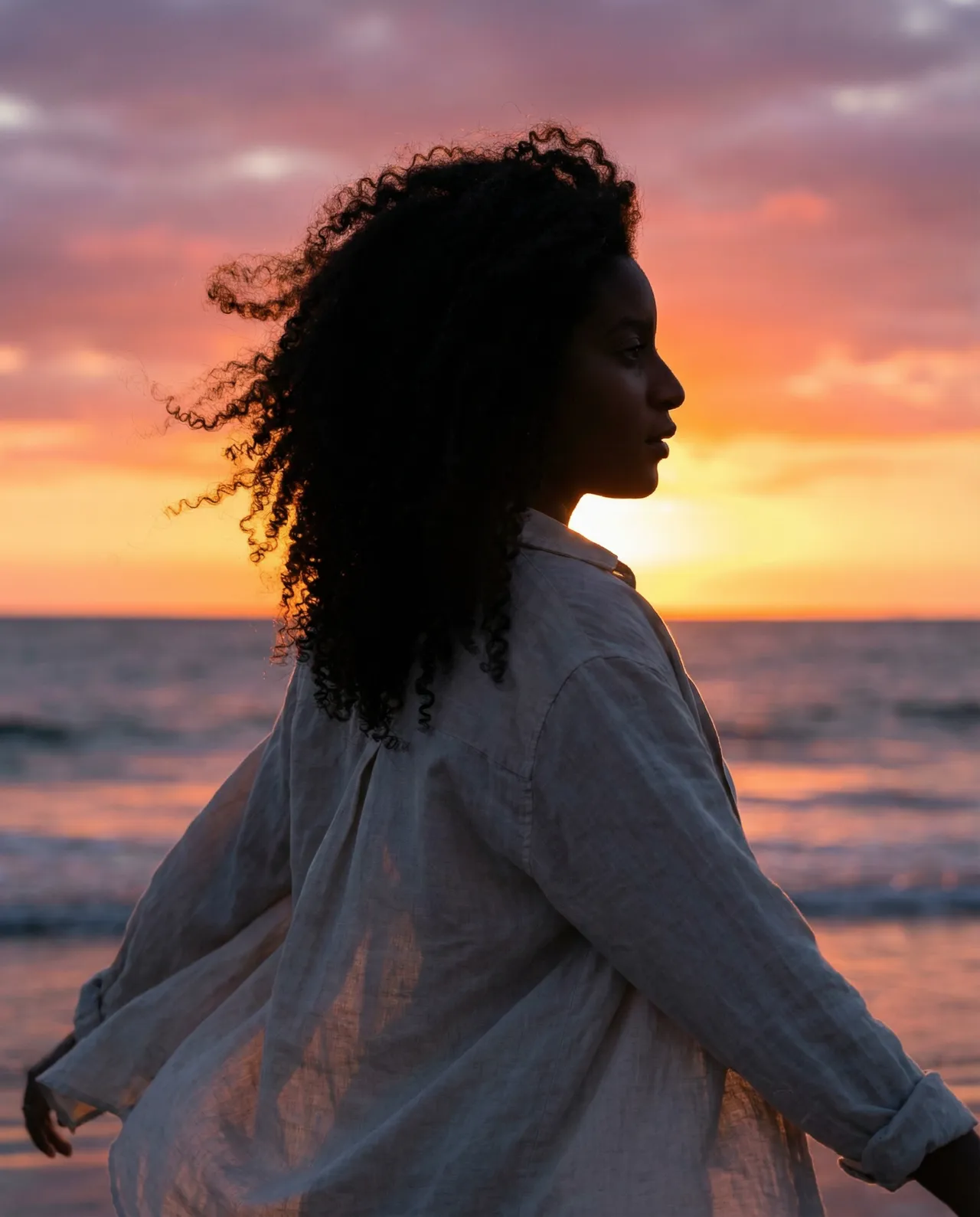 Atmospheric Sunset Beach Profile Portrait with Wind Blown Shirt