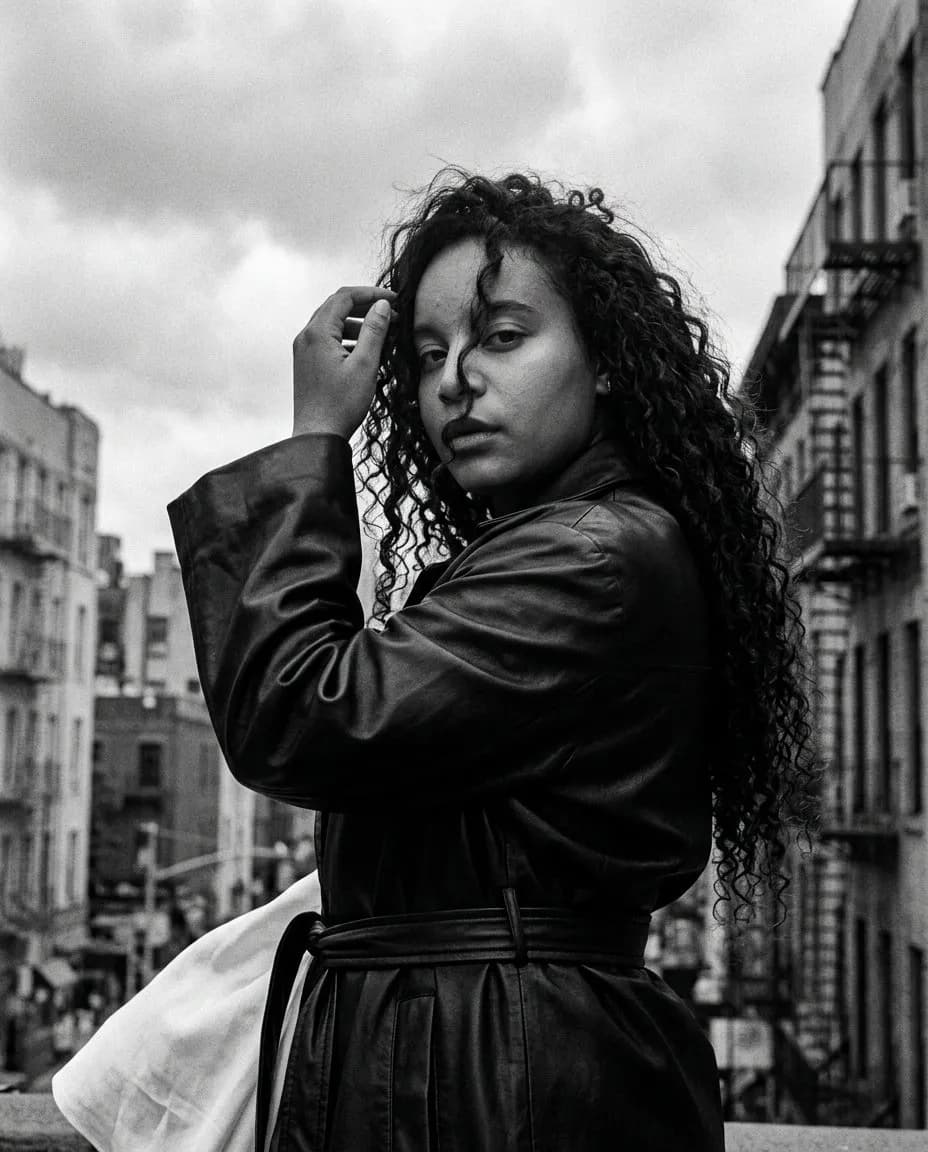 High-Contrast Black and White Urban Portrait with Film Grain