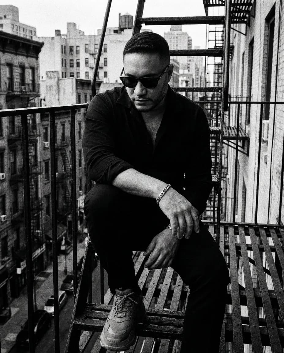 Noir Grunge Black-and-White Portrait on Urban Staircase