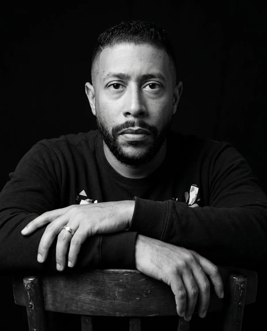 Cinematic Black-and-White Studio Portrait with Dramatic Low Angle